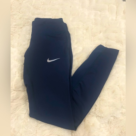Nike Pants - NWOT Nike XSmall navy blue leggings with mesh detail on inner calf region
